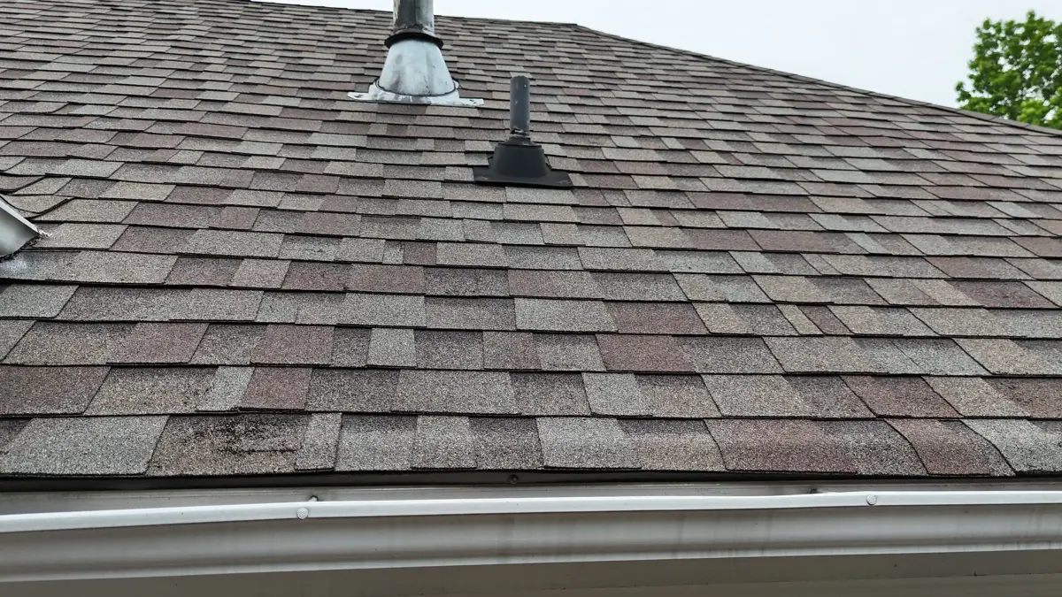 Completed shingle roof with vent pipes and gutter edge, Southern Premier Roofing work near Winder GA
