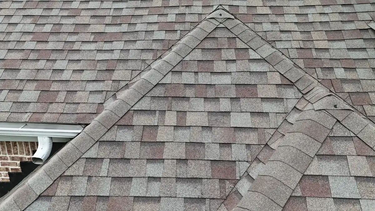 Close view of completed shingles around intersecting roof ridges, Southern Premier Roofing work near Arnoldsville GA
