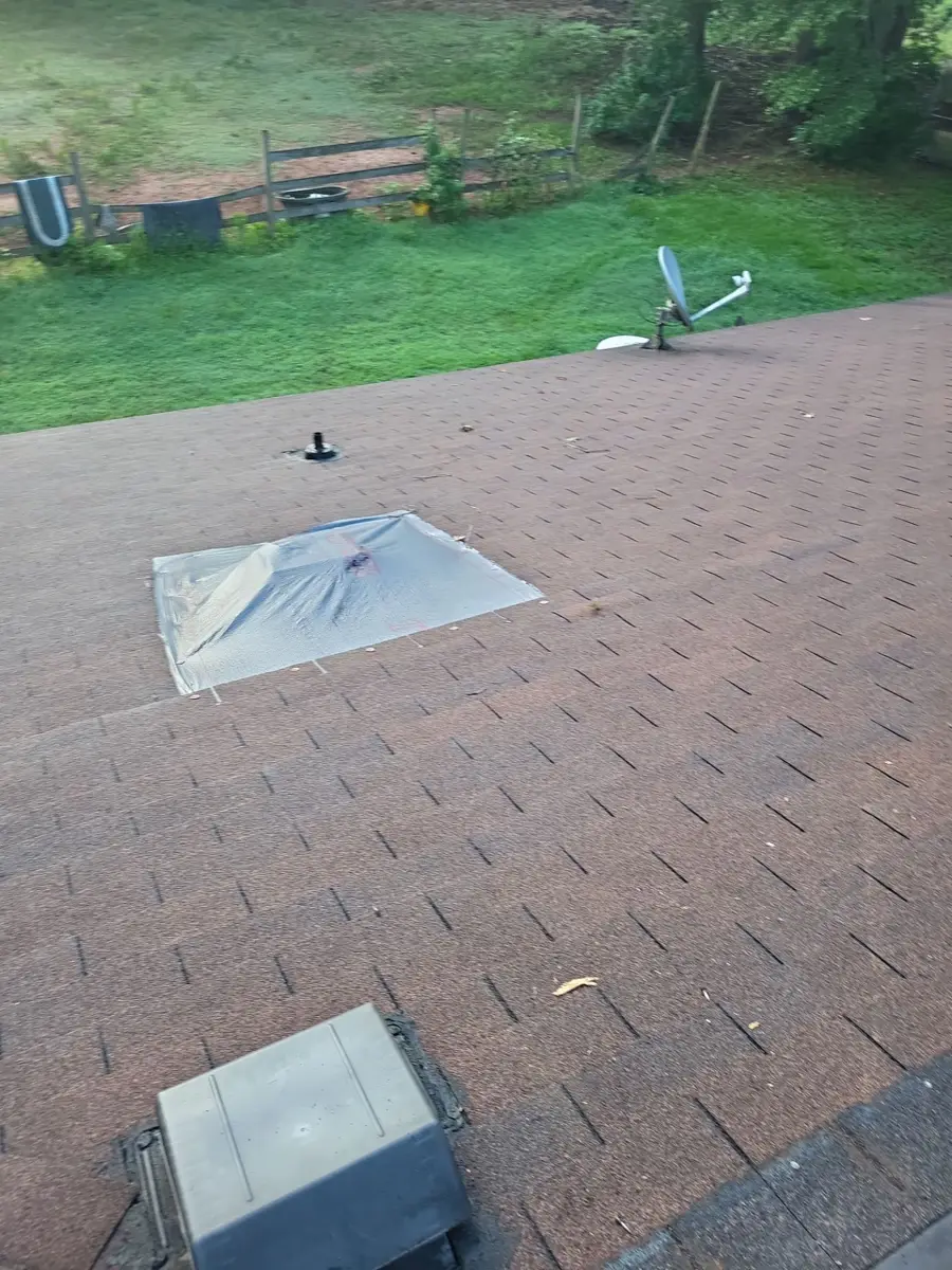 Completed shingle roof with skylights and rooftop ventilation, Southern Premier Roofing work near Athens GA