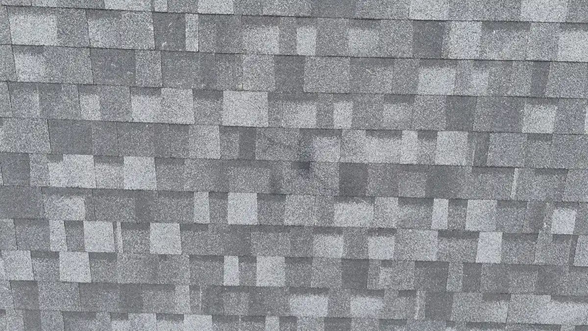 Close view shows newly installed gray architectural shingles across roof surface, Southern Premier Roofing work near Bishop GA