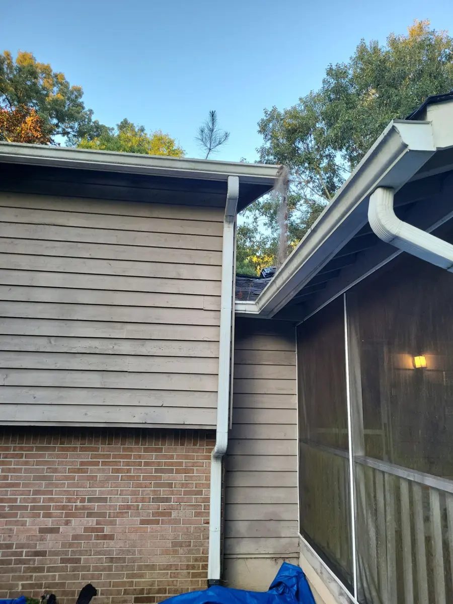 Roof edge and gutter connection between adjoining exterior walls, Southern Premier Roofing work near Bishop GA