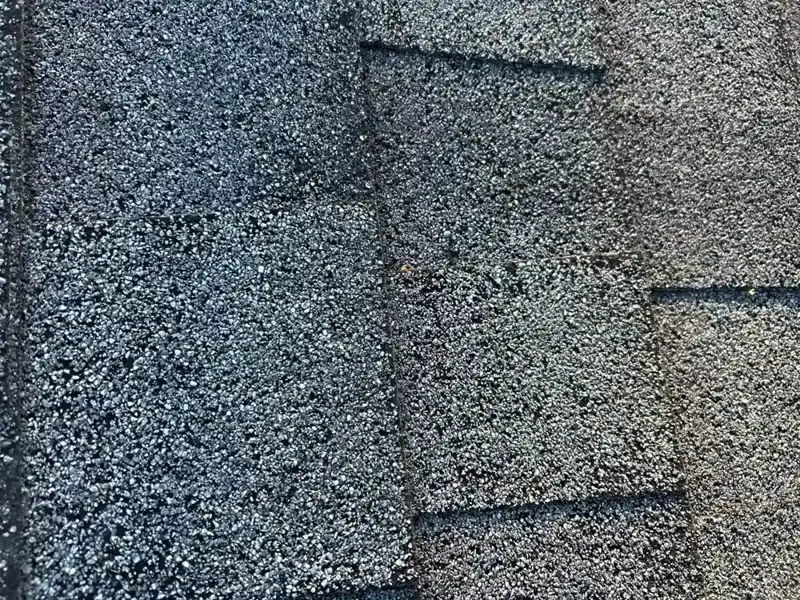Close view of overlapping gray asphalt shingles on a roof, Southern Premier Roofing work near Bogart GA