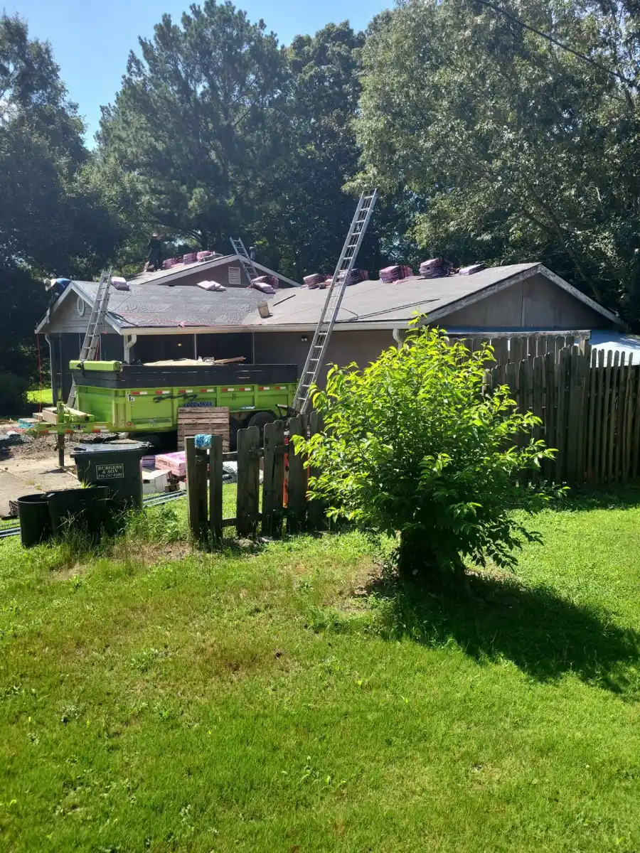 Roofing work underway with ladder, workers, and shingles visible, Southern Premier Roofing work near Bogart GA