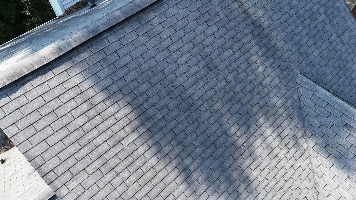 Close aerial view showing neat gray shingles across roof surface, Southern Premier Roofing work near Good Hope GA