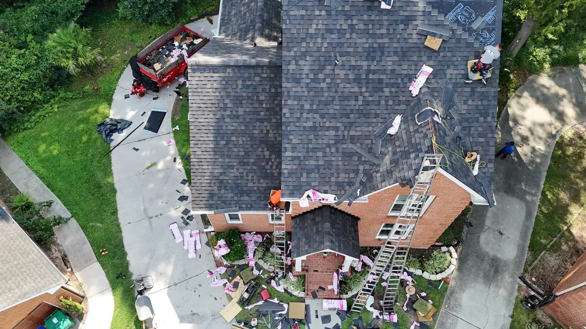 Roofing crew materials and shingles arranged across roof, Southern Premier Roofing work near Grayson GA