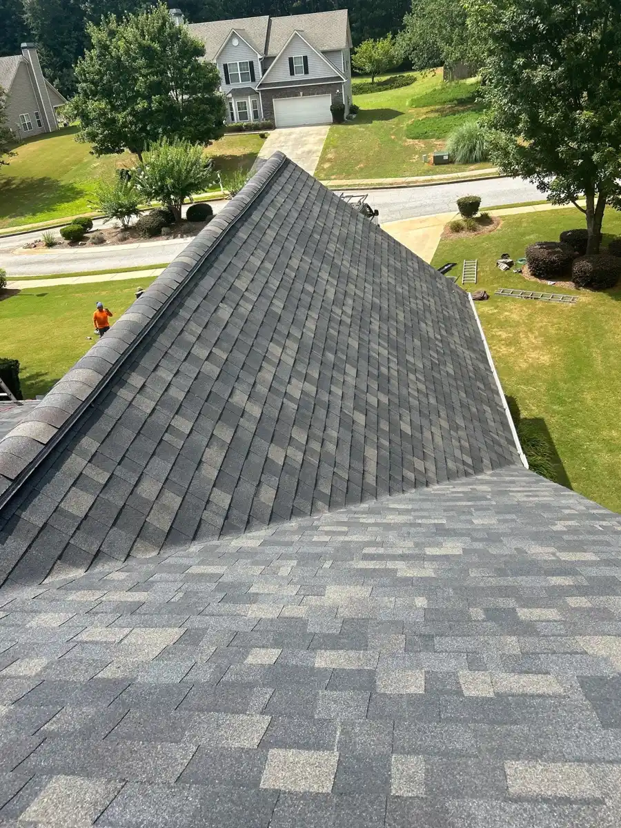 Wide view of completed shingle roof over front-facing roof sections, Southern Premier Roofing work near Hoschton GA