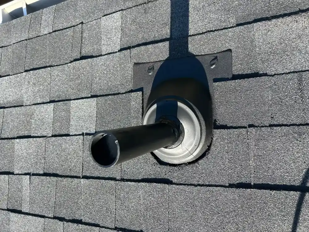 Roof pipe flashing detail installed over asphalt shingles, Southern Premier Roofing work near Lilburn GA