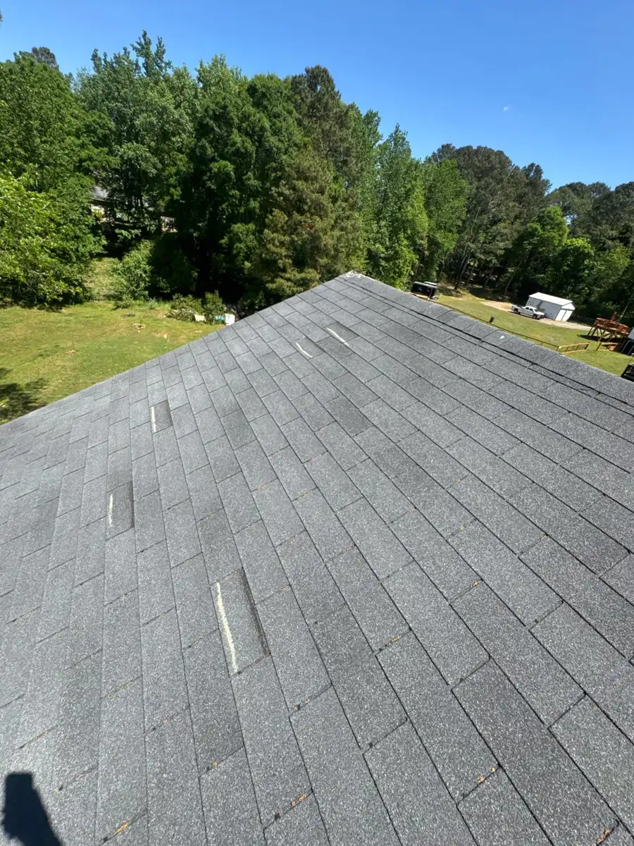 Clean gray shingle roof viewed from elevated angle, Southern Premier Roofing work near Maysville GA