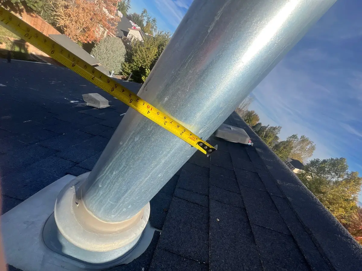 Roof vent pipe with surrounding flashing and shingles, Southern Premier Roofing work near Oakwood GA