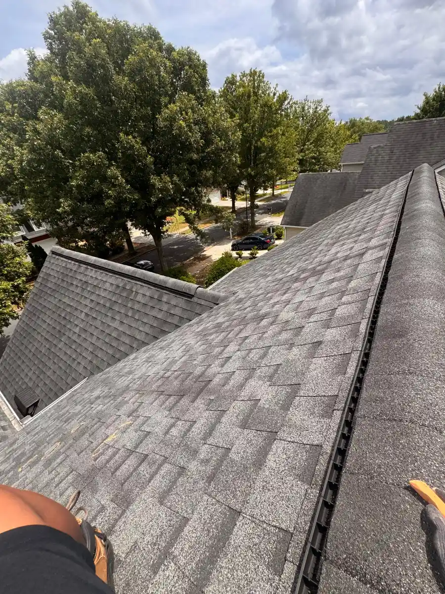 Gray shingle roof ridges and valleys viewed from elevated position, Southern Premier Roofing work near Peachtree Corners GA