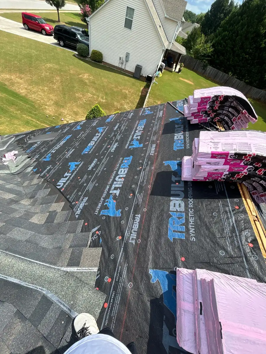 Roof covered with printed underlayment and stacked roofing materials, Southern Premier Roofing work near Peachtree Corners GA