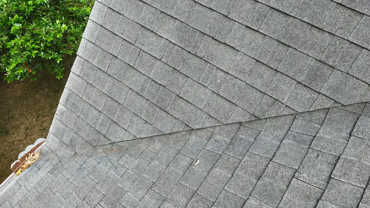 Gray shingles installed across roof valley and adjoining roof planes, Southern Premier Roofing work near Social Circle GA