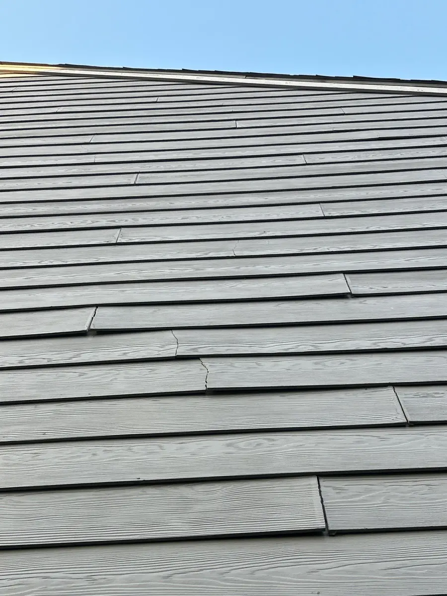 Close view of completed gray shingle roof with aligned overlapping courses, Southern Premier Roofing work near Statham GA