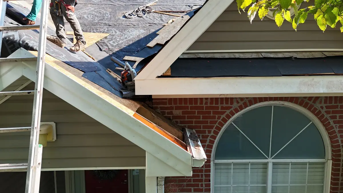 Roof flashing installed around dormer and brick wall intersection, Southern Premier Roofing work near Statham GA