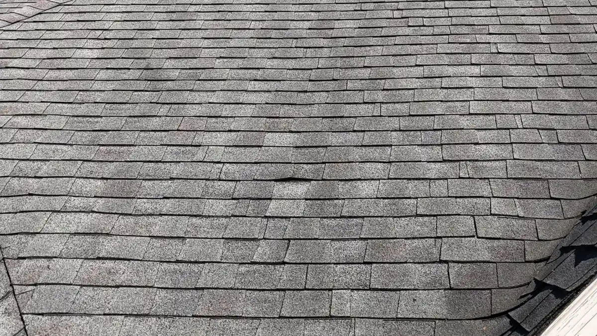 Wide view of uniform asphalt shingles covering a sloped roof, Southern Premier Roofing work near Winterville GA
