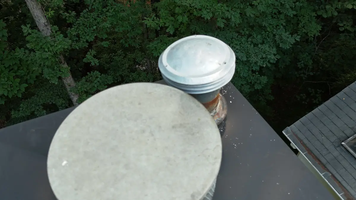 Close view of roof vent and circular flashing cap, Southern Premier Roofing work near Colbert GA