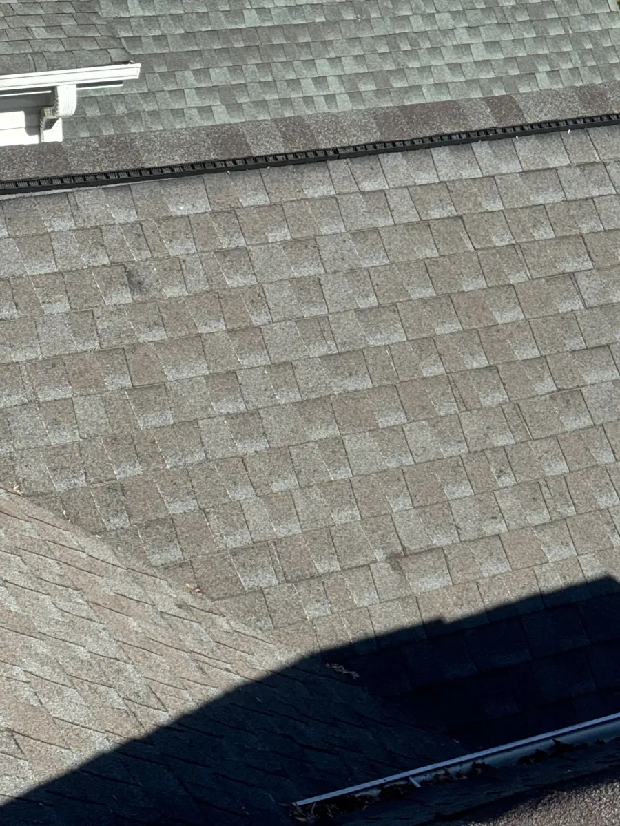 Wide view of weathered asphalt shingles across roof surface, Southern Premier Roofing work near Covington GA