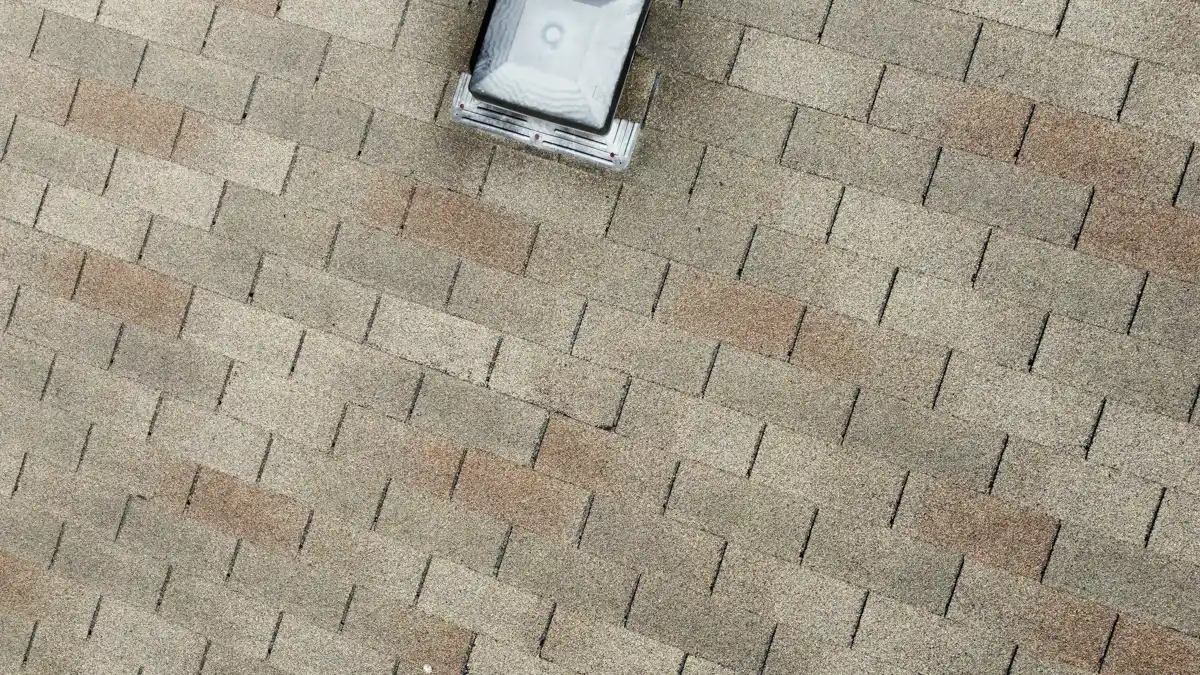 Uniform asphalt shingle roof surface with square vent visible, Southern Premier Roofing work near Cumming GA