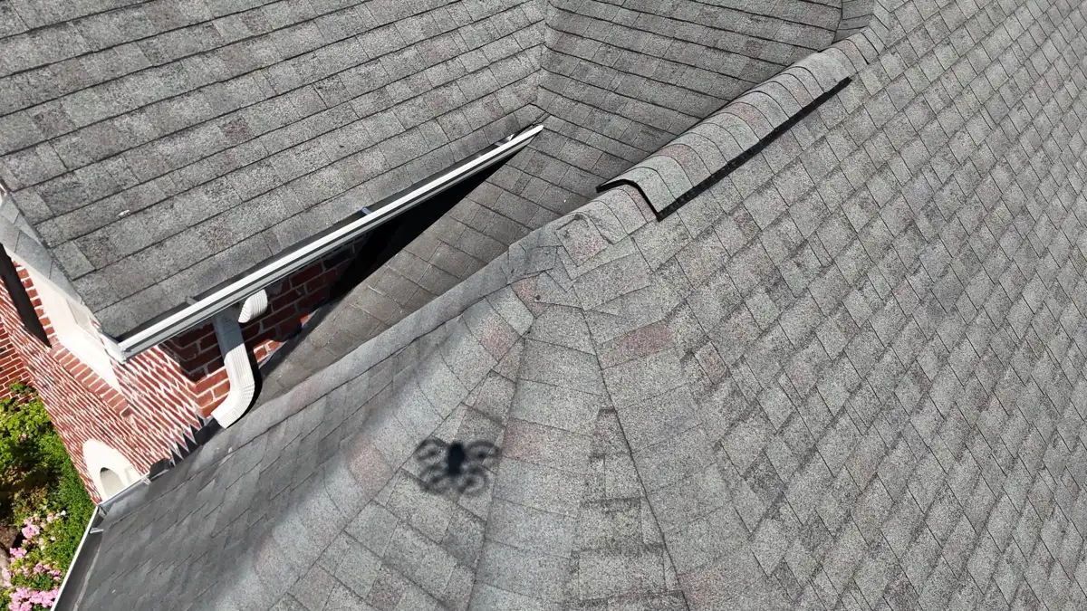 Roof valley and flashing detail between intersecting shingle sections, Southern Premier Roofing work near Duluth GA