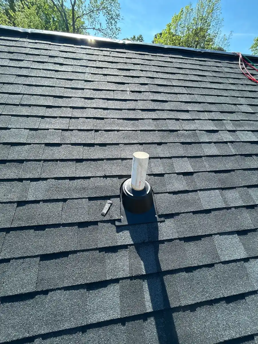 Close view of completed asphalt shingles and roof vent, Southern Premier Roofing work near Gainesville GA
