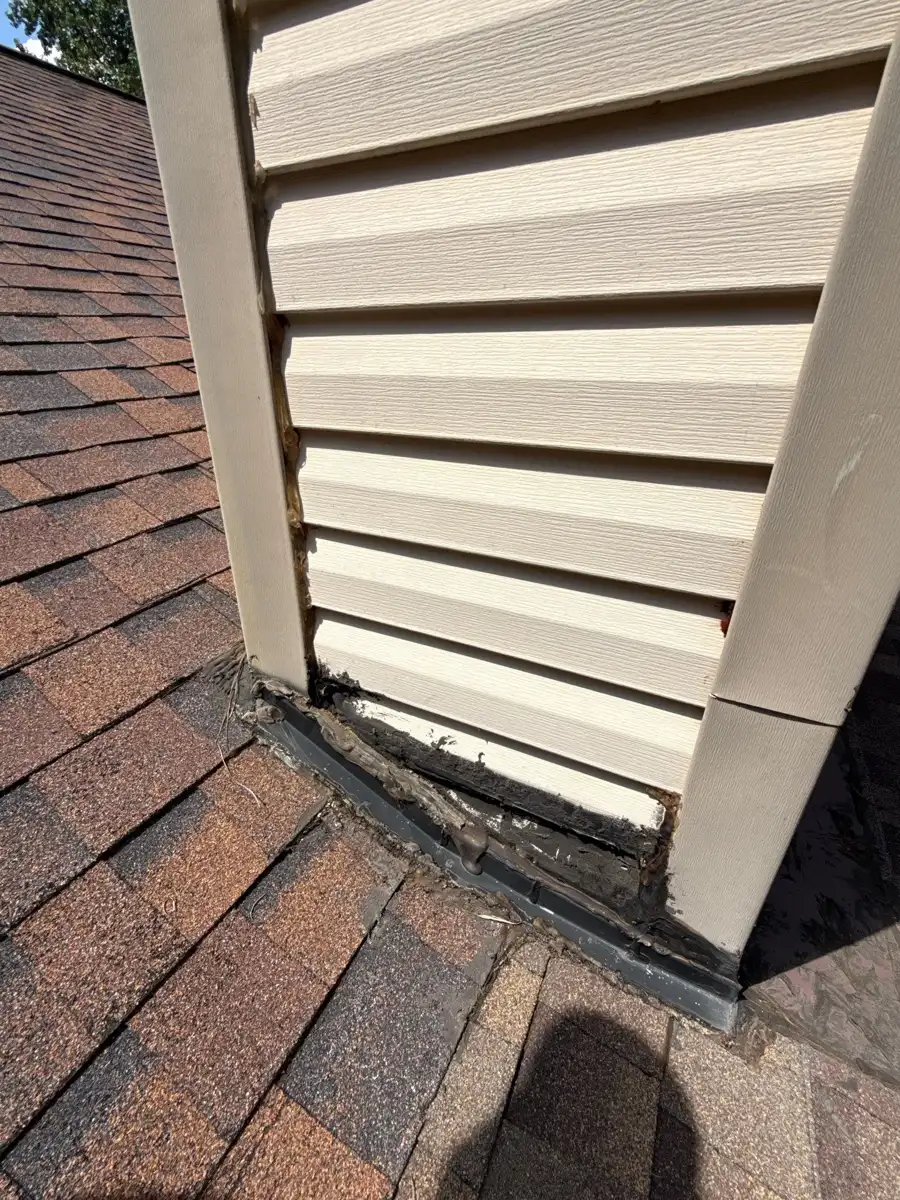Roof shingles surround louvered vent with exposed edge flashing, Southern Premier Roofing work near Good Hope GA