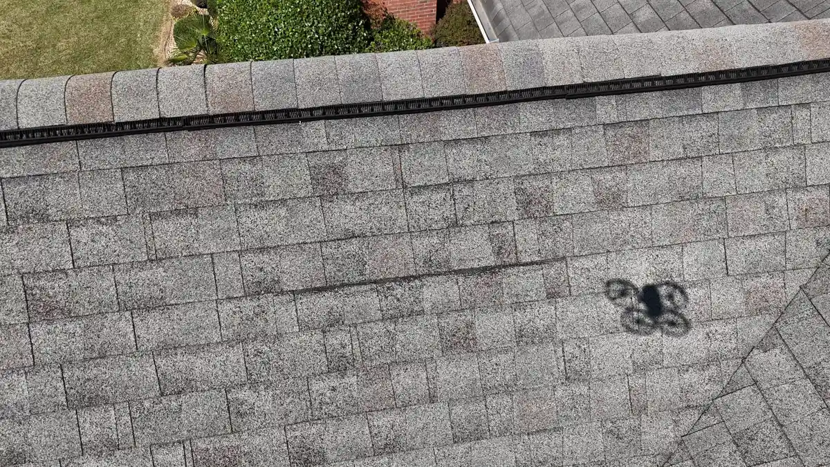 Close aerial view of clean completed asphalt shingle roof surface, Southern Premier Roofing work near Good Hope GA