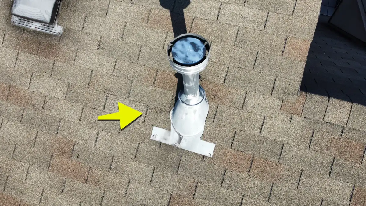 Close view of roof vent flashing among asphalt shingles, Southern Premier Roofing work near Homer GA