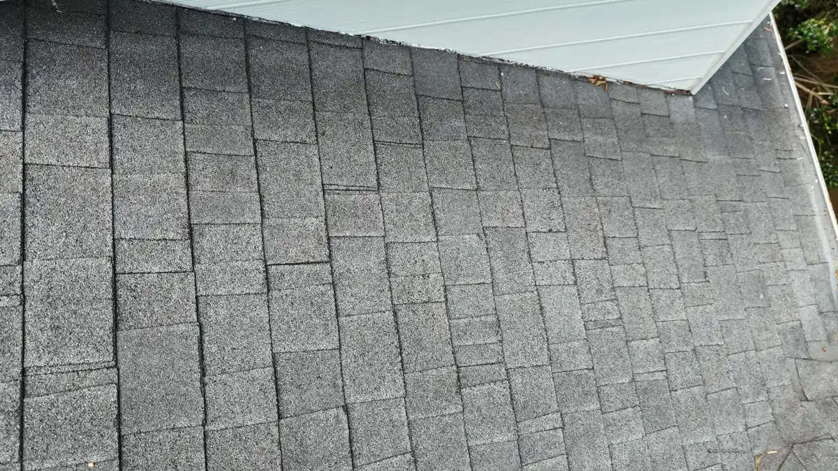 Uniform gray shingles installed beside white-sided roof structure, Southern Premier Roofing work near Hull GA