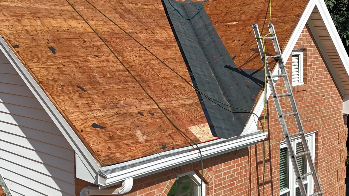Roof decking and dark underlayment visible during installation, Southern Premier Roofing work near Johns Creek GA