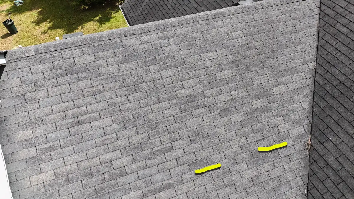 Roof surface with several highlighted areas of shingle wear, Southern Premier Roofing work near Lilburn GA
