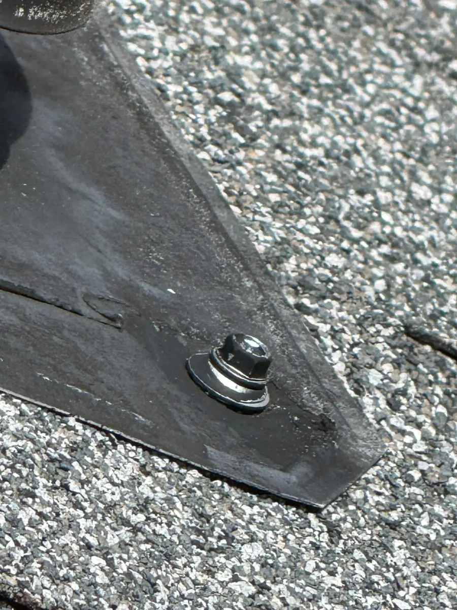 Closeup of fastened black flashing membrane on shingle roof, Southern Premier Roofing work near Lithonia GA