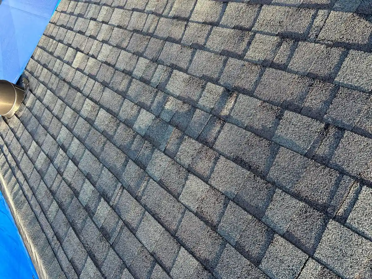 Wide view of weathered gray shingles covering a sloped roof, Southern Premier Roofing work near Maysville GA