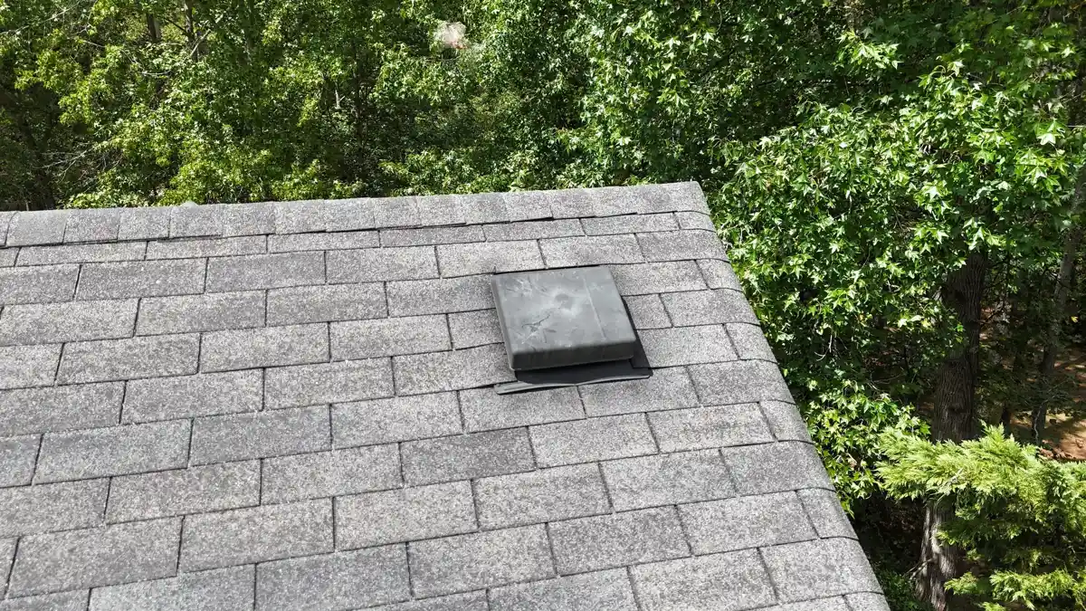 Shingle roof section includes a small raised roof vent, Southern Premier Roofing work near Monroe GA