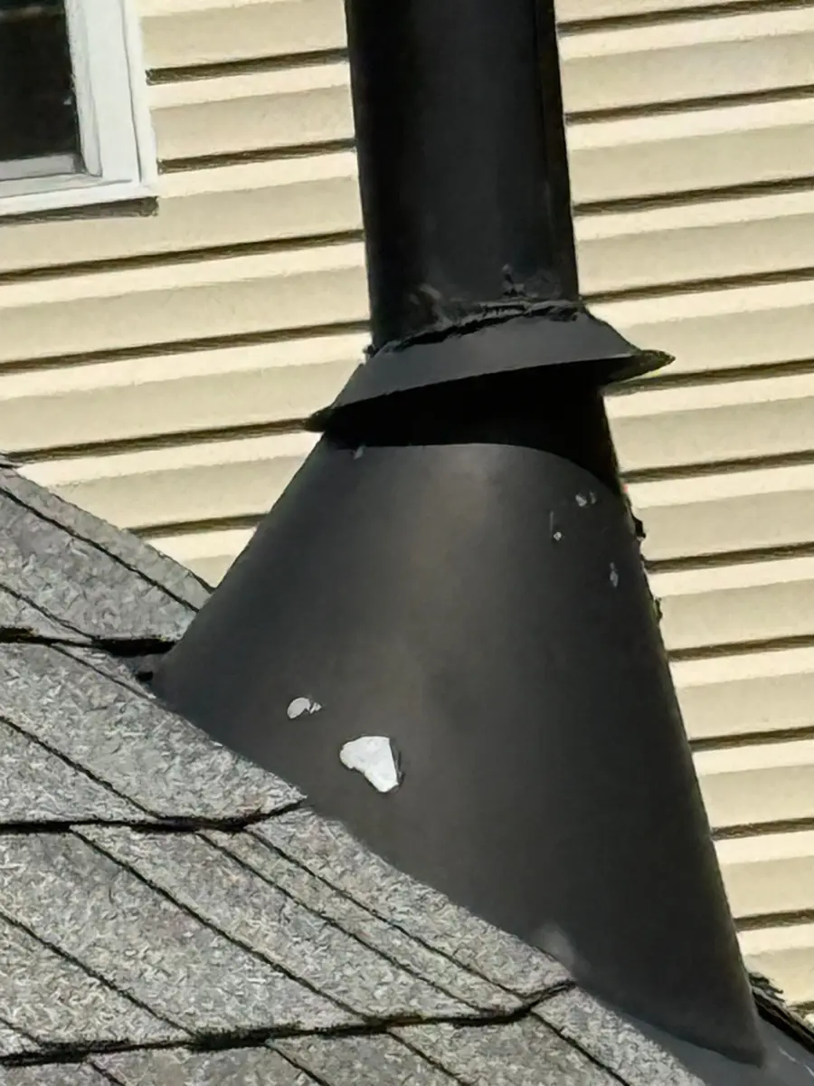 Close view of black roof vent base and surrounding shingles, Southern Premier Roofing work near Rest Haven GA