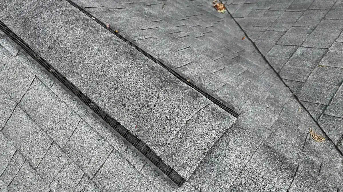 Roof shingles and raised flashing detail on sloped surface, Southern Premier Roofing work near Snellville GA