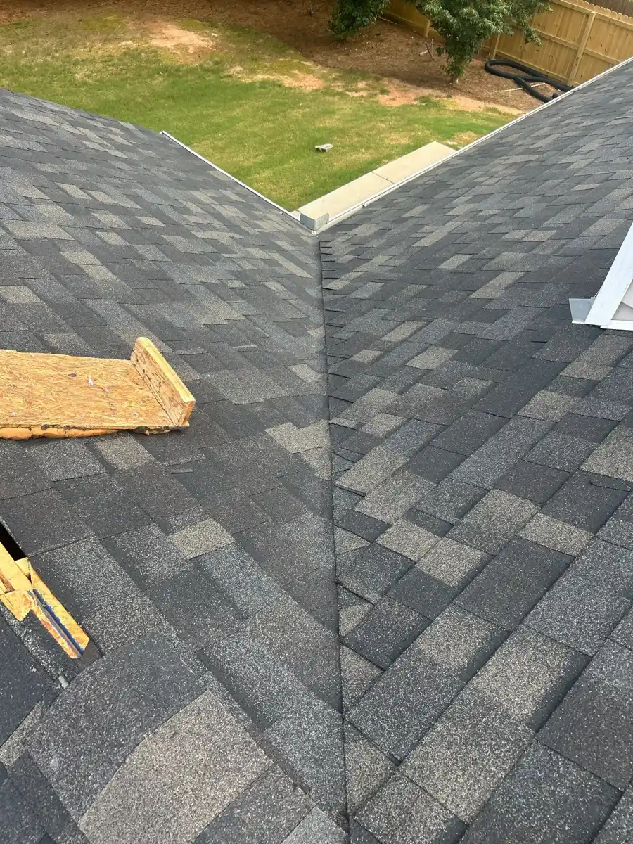 Completed shingle roof with valley and contrasting roof sections, Southern Premier Roofing work near Sugar Hill GA