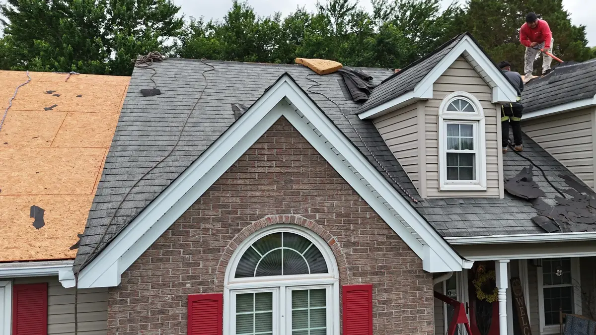 Completed gray shingle roof with brick gables and dormer details, Southern Premier Roofing work near Tucker GA