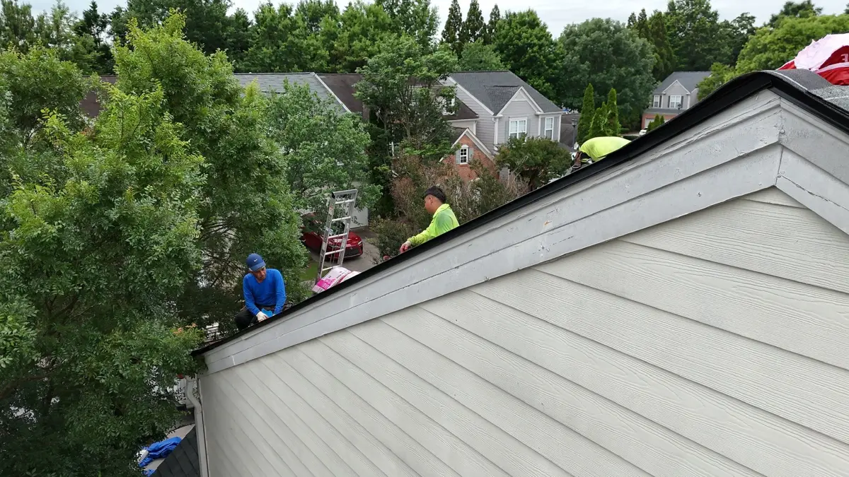 White roof edge flashing installed along sloped gable edge, Southern Premier Roofing work near Walnut Grove GA