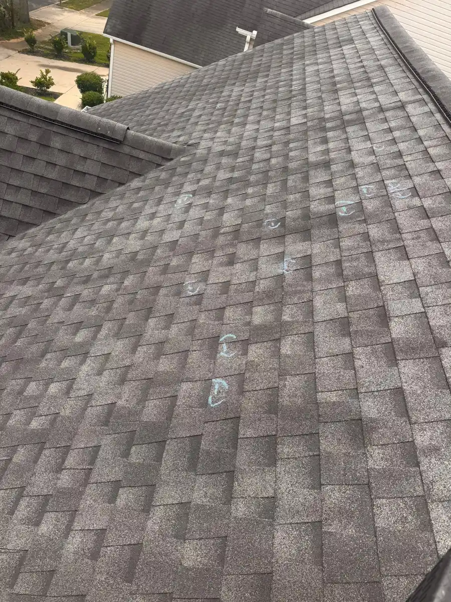 Close view of completed gray shingle roof surface and intersecting rooflines, Southern Premier Roofing work near Walnut Grove GA