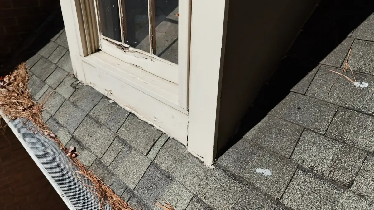 Roof flashing detail around projecting wall and window corner, Southern Premier Roofing work near Watkinsville GA