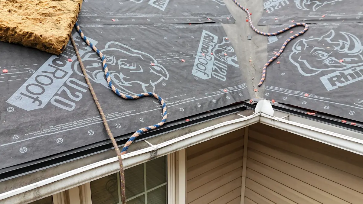Roof valley and eave flashing beneath underlayment near siding, Southern Premier Roofing work near Statham GA